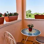 Luciana House, *